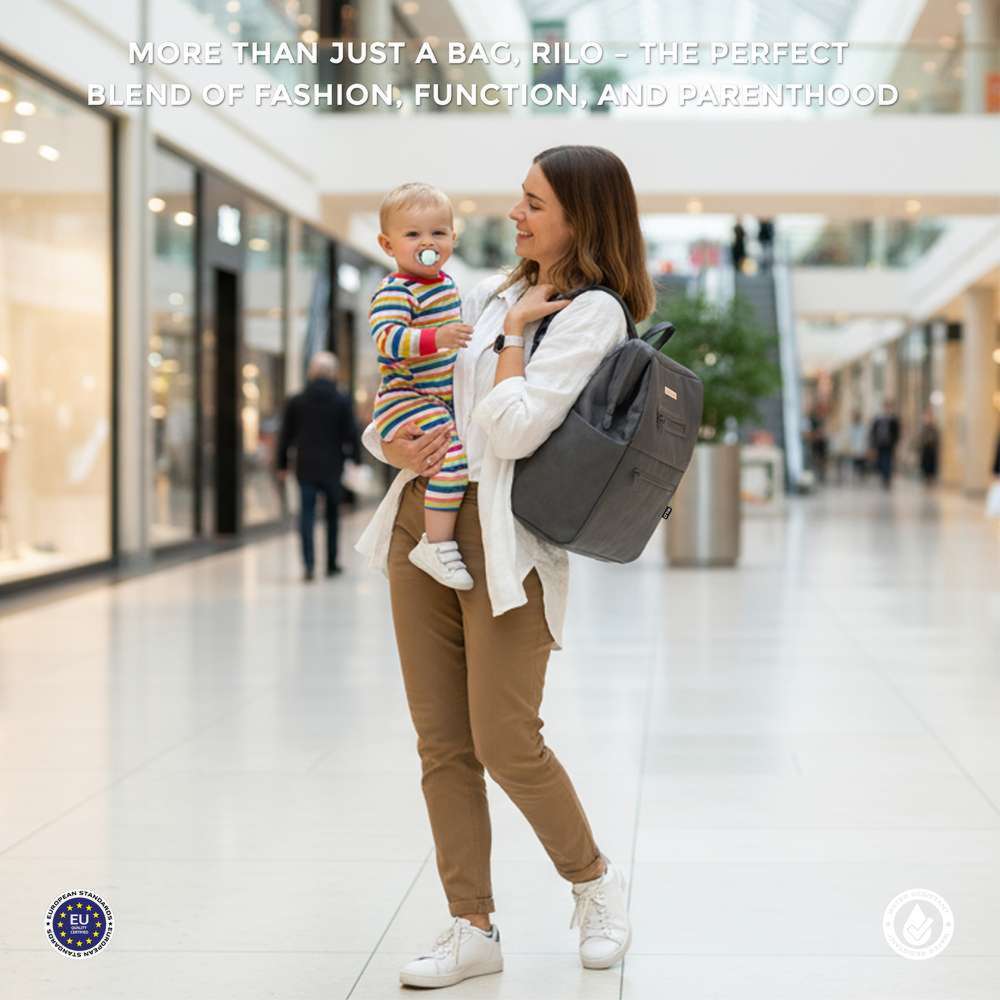 نيو بريز - شنطة ظهر ريلو للحفاضات، 7 قطع، مع حصيرة تغيير الحفاضات، وشنطة للقطع مبللة، وأكياس صغيرة - رمادي غامق