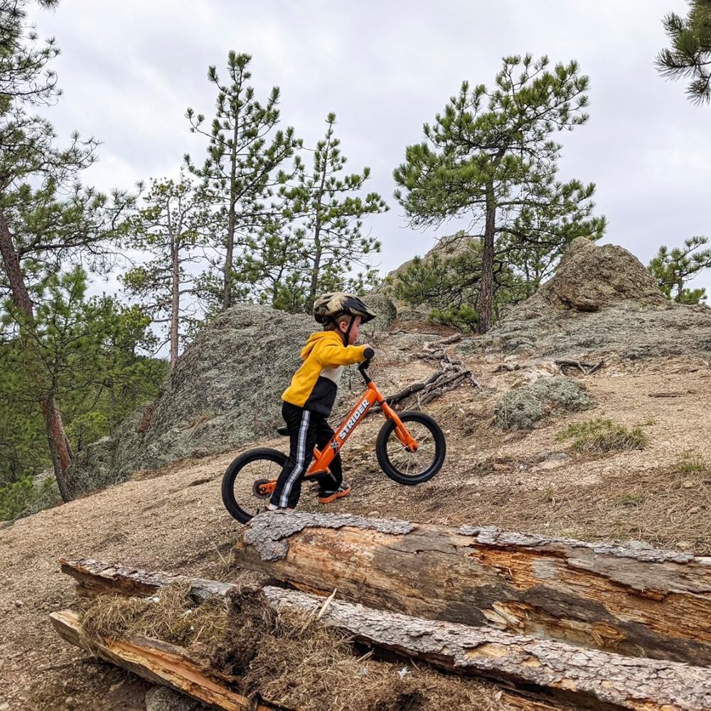 Strider - 14x Kids Balance Bike - No Pedal Training Bicycle - Lightweight Frame - Adjustable Seat And Handlebars - For Children Ages 3 To 7 Years Old