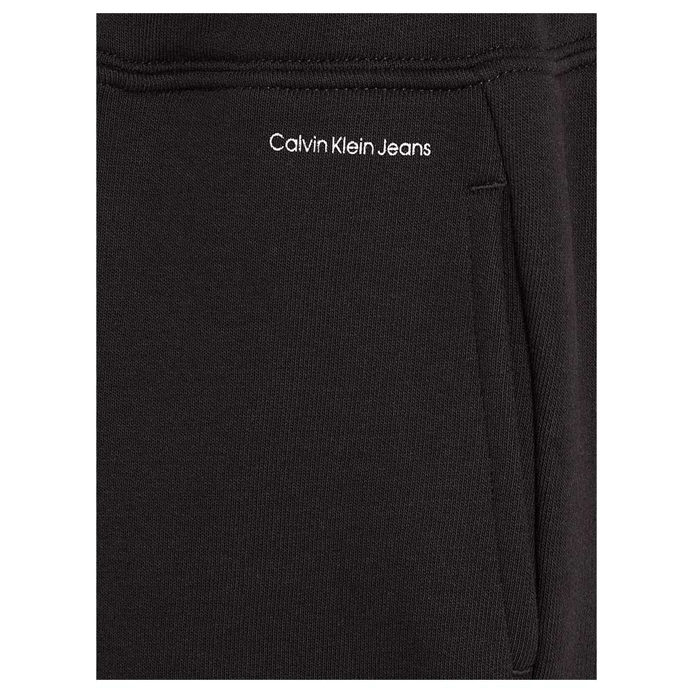 كالفن كلاين - بنطال رياضة واسع بشعار سي كي - أسود